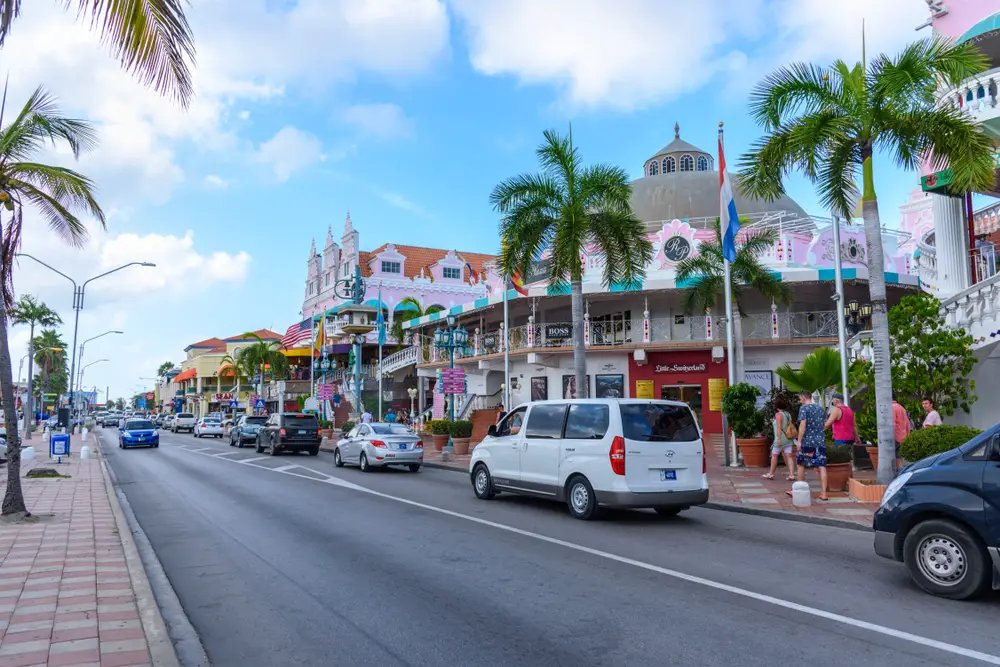 Long street in the picturesque town of Oranjestad for a piece titled Is Aruba Safe to Visit
