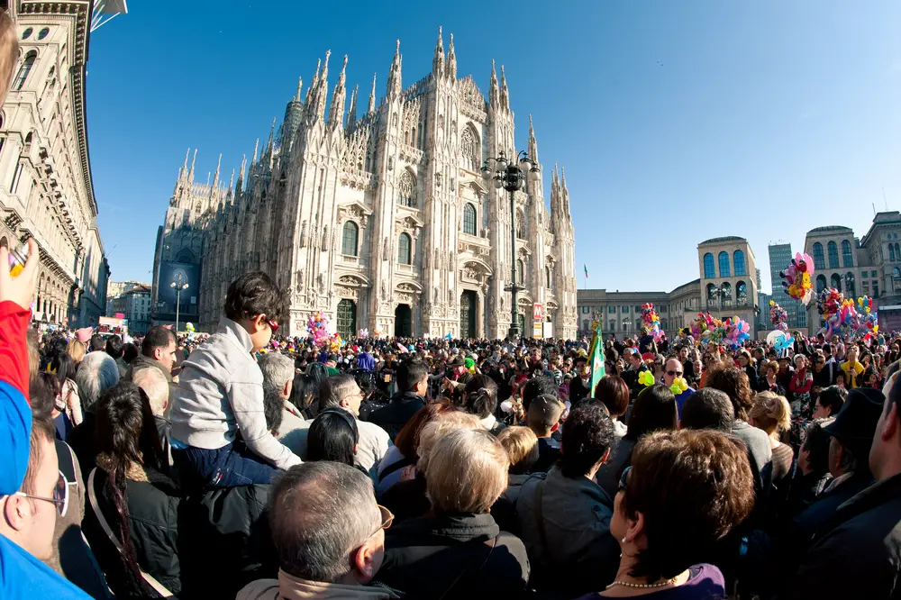 Large crowds of tourists packed into Duomo Square during the worst time to visit Milan, September and October