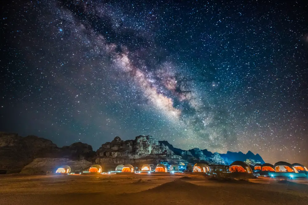 Image of the spectacular Milky Way constellation above the Wadi Rum desert during the best time to visit Jordan