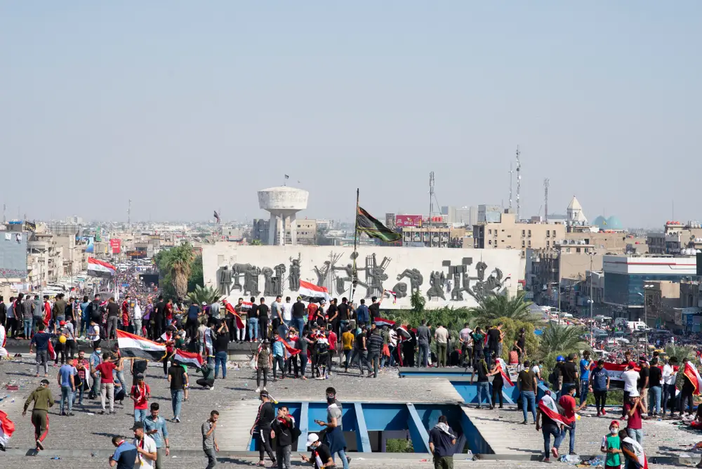 People demonstrating in a public square in Baghdad to show that Iraq is not safe to visit