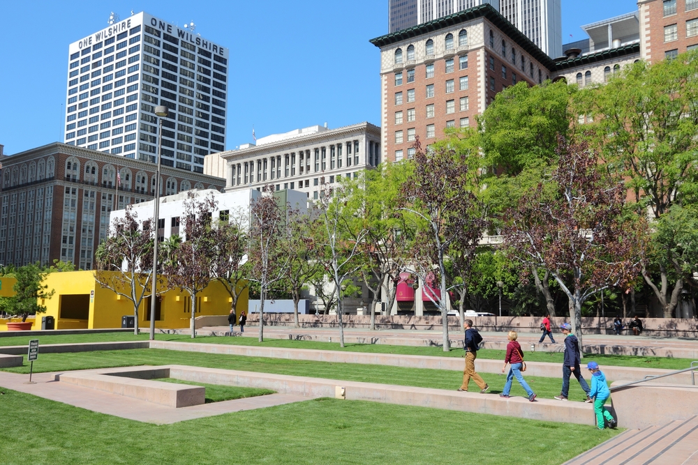 People walking through Pershing Square Park in Los Angeles during the overall best time to go to the city