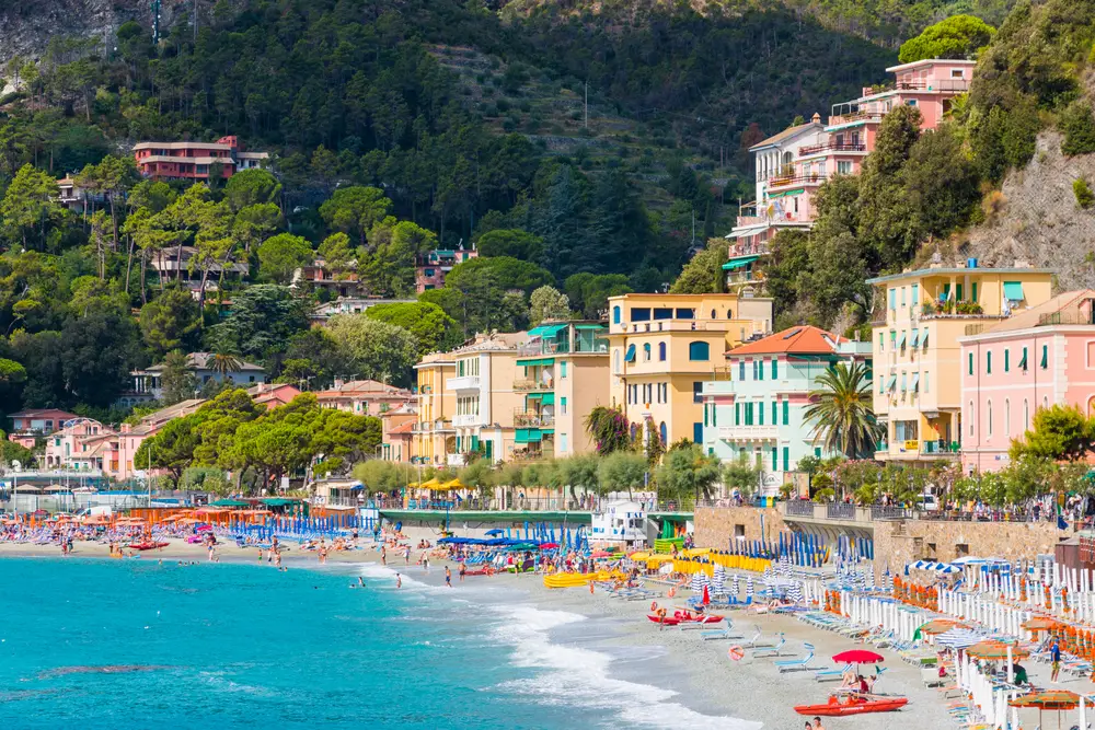 Aerial view of the sandy beach at Monterosso al Mare on a warm summer day during the best time to visit Cinque Terre