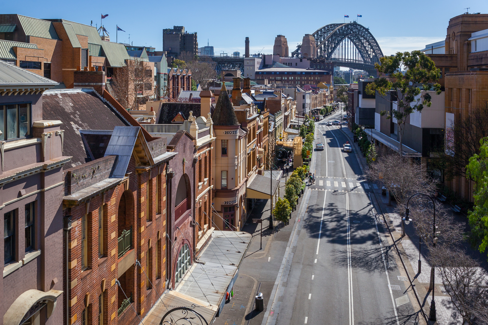Rooftop view of St. George Street pictured with the Harbor Bridge in the background for a piece titled Is Sydney Safe to Visit