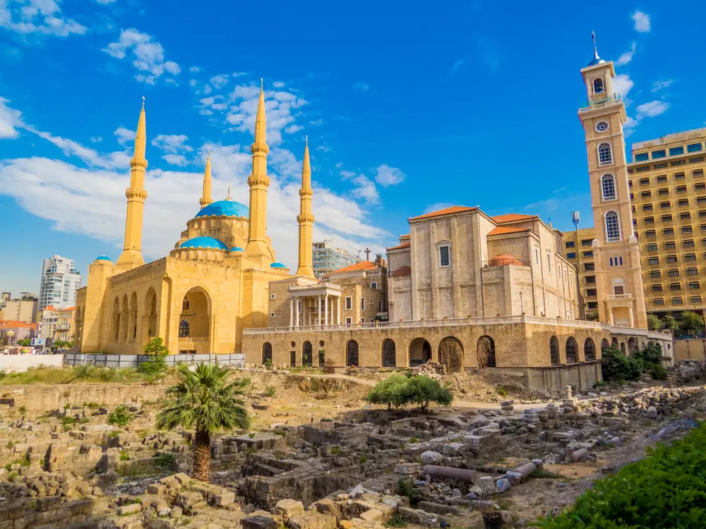 View of Saint George Cathedral and the Mohammad Al-Amin Mosque in Beirut on a clear day like travelers see during the best time to visit Lebanon
