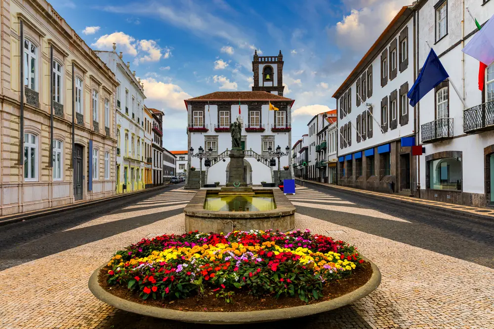 City Hall in Ponta Delgada with a bell tower in the middle of a picturesque village