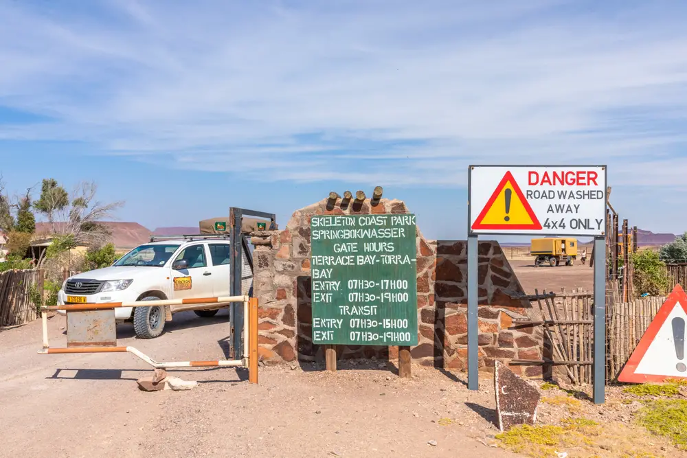 Warning sign that says warning 4x4 only for a piece on areas to avoid in Namibia