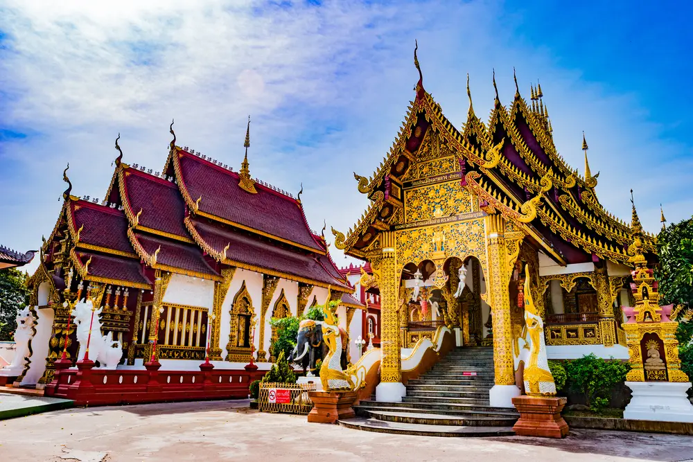 Picturesque golden and white temple in Chiang Mai, pictured during the spring, the overall best time to visit