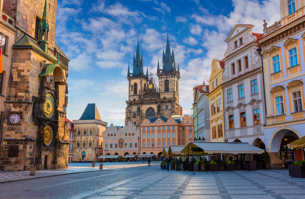 Prague's Old Town Square and Tyn Church seen from the ground level on a spring morning to highlight one of the best European cities to visit