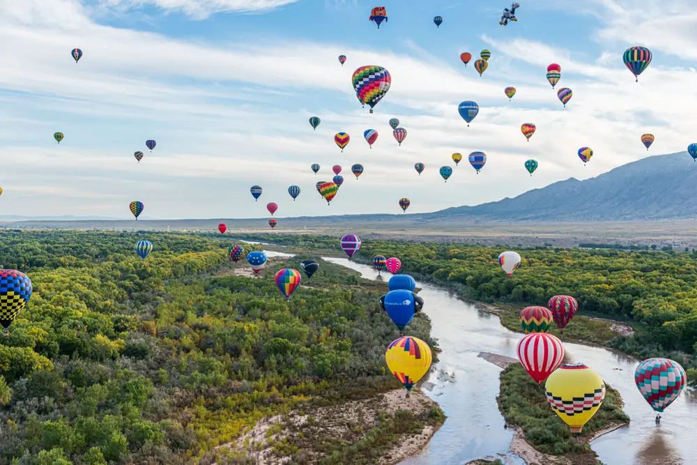 Many colorful hot air balloons over Albuquerque for a guide to whether or not the city is safe to visit