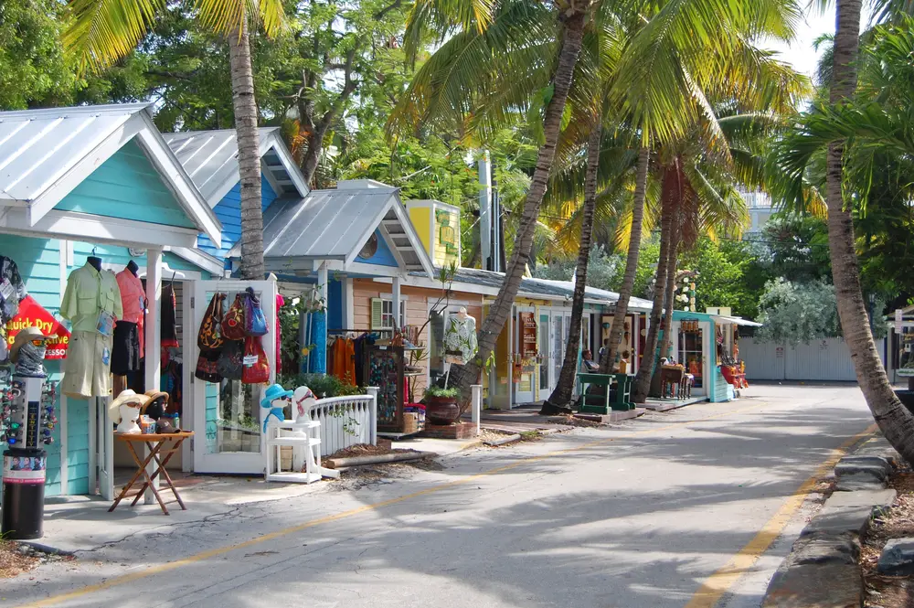 Unique street in Key West (for a guide to the cost of a trip there) with colorful little shacks lining the street