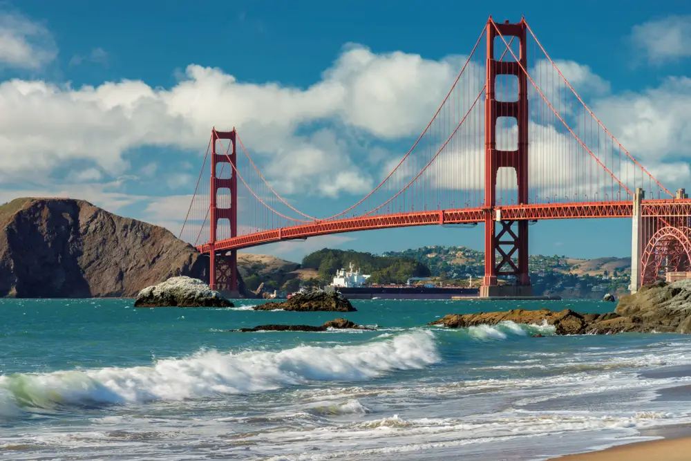 The Golden Gate Bridge view from Baker's Beach in San Francisco for a comparison of Northern California vs Southern California