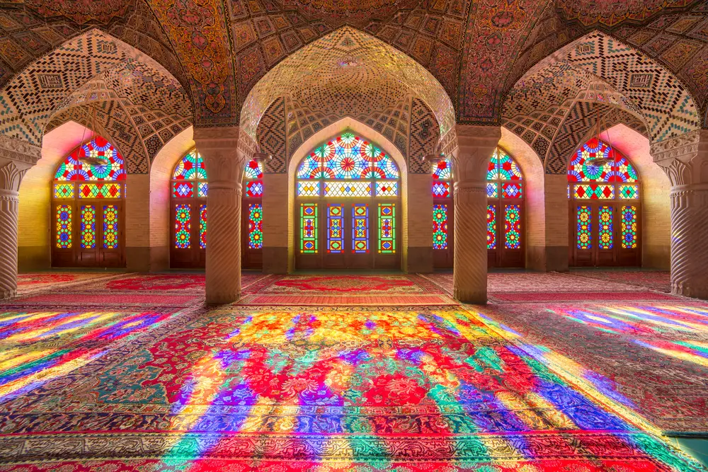 Colorful reflections from the stained glass windows of a church in Shiraz, pictured during the best time to visit Iran