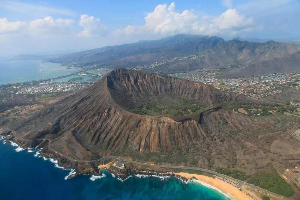 Aerial view of Diamond Head volcanic crater in Honolulu, HI where it takes 6-14 hours to fly from the US